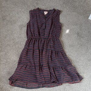 Sleeveless grey dress with red/orange pattern